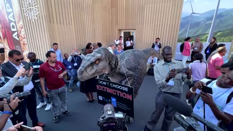 Dinosaur brings extinction warnings to COP27