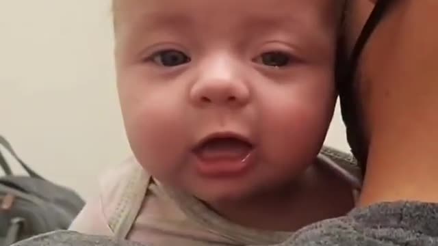 Adorable baby crying and his mother giving him courage