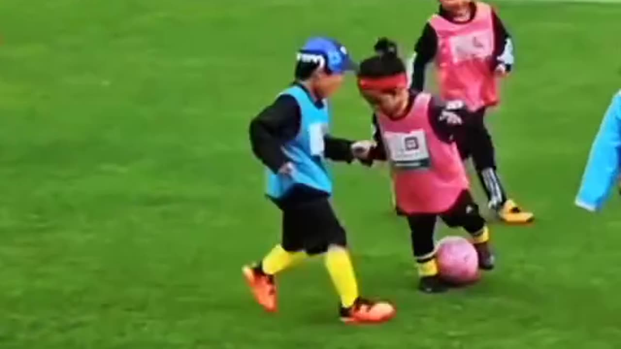 Kids play football