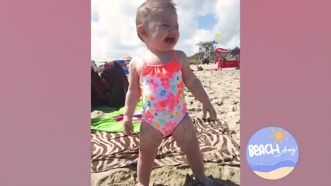 Funny Baby's Reaction On The Beach