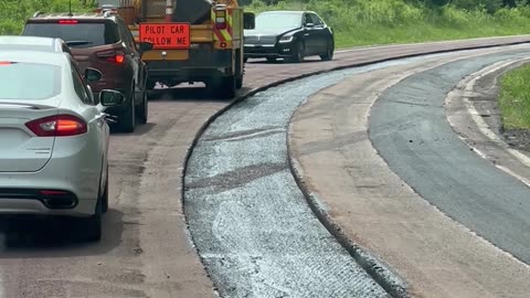 Car Reverses Through Construction Zone