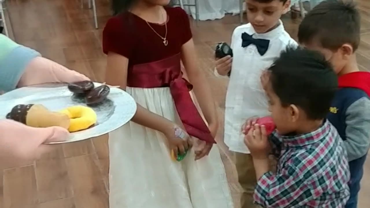 Houston mascot party character coco Mellon jj baby plays sharing is caring game Tandoori kabob house
