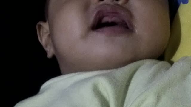 my one years old baby try to say something