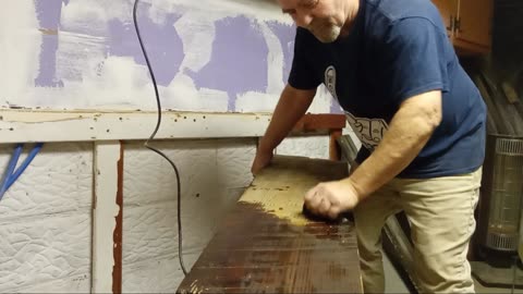Watch vintage yellow pine soak up the stain.