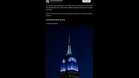 The Empire State Building lit up in Pfizer blue to commemorate the CDC's...