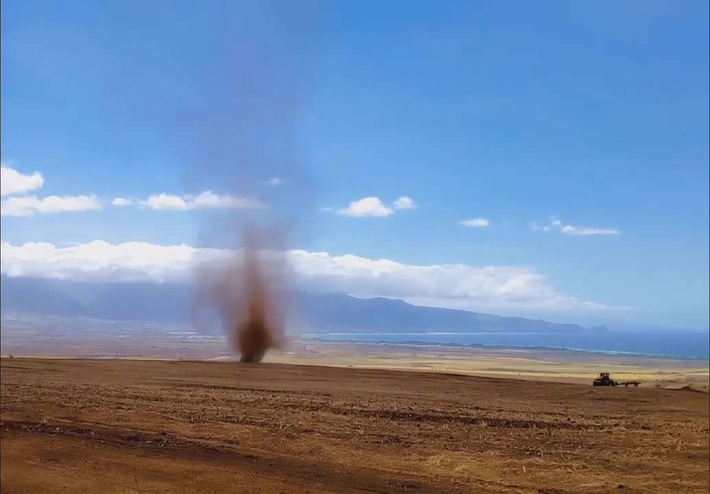 Small Dust Devil Forms at a Shear Line