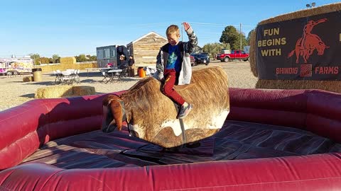 Camden (9) and Abe (7) Ride a Mechanical Bull!