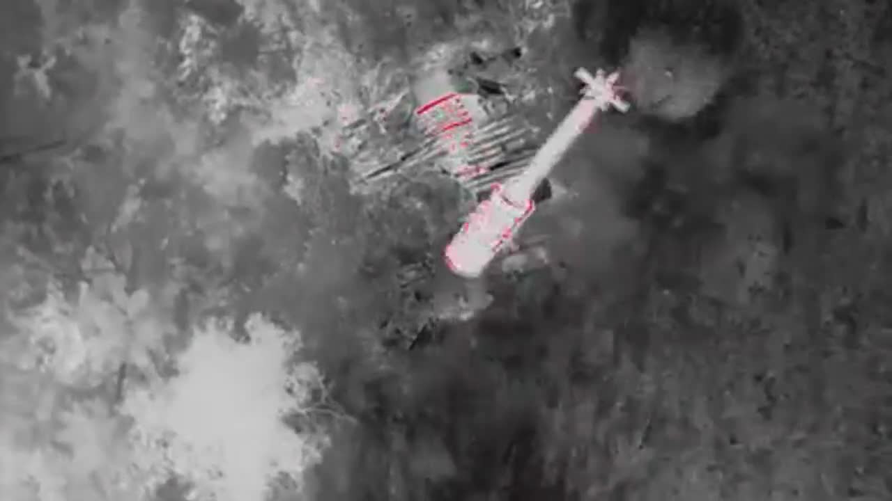 Ukrainian Drone dropping a modified RKG-3 anti-tank grenade on D/LNR positions in the Donbas region