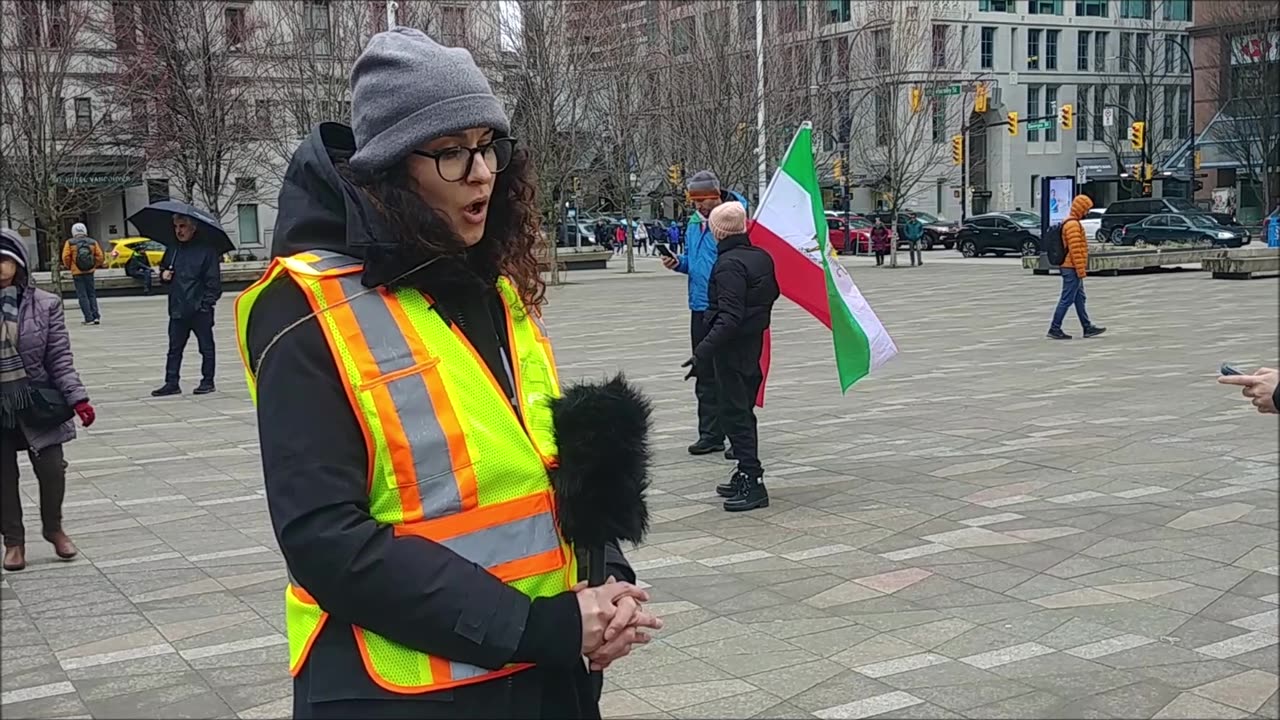 Iranian government is poisoning schoolgirls. Protest at Vancouver Art Gallery March 12, 2023