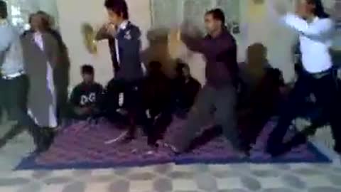 Men are dancing in a wedding party