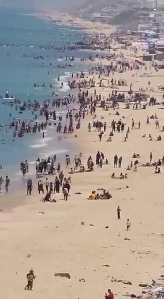 Despite the ongoing conflict, the shores of Gaza remain bustling with people enjoying the beach