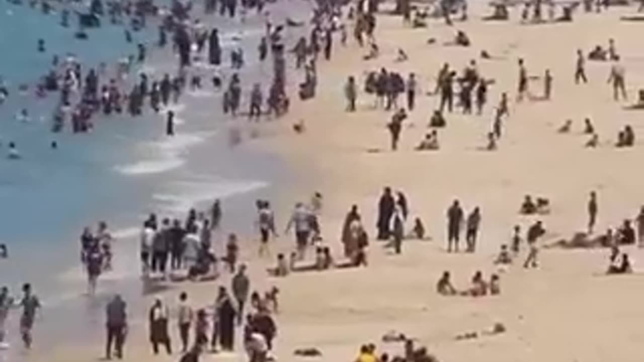 Despite the ongoing conflict, the shores of Gaza remain bustling with people enjoying the beach