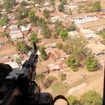 Patrolling in the CAR from the cockpit of the Russian Mi-8 transport and combat helicopter of the