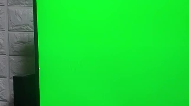 Fingers on the green screen (chroma key available)