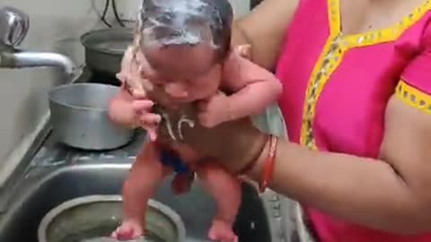 Baby first bath