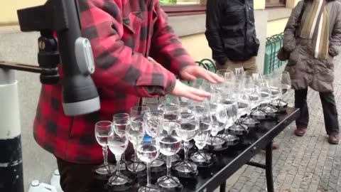 AMAZING AN STREET ARTIST PLAYING HALLELUJAH WITH CRYSTAL GLASSES