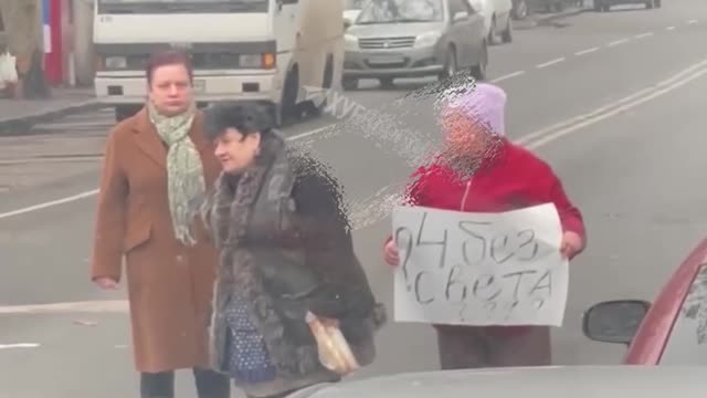 12.12.2022. Odessa, pensioners with placards "4 days without light.