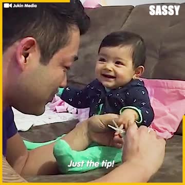 Overdramatic baby scares Dad when cutting her nails
