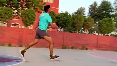 Guy Performs Amazing Basketball Shot While Jumping Over a Bowl Of Water