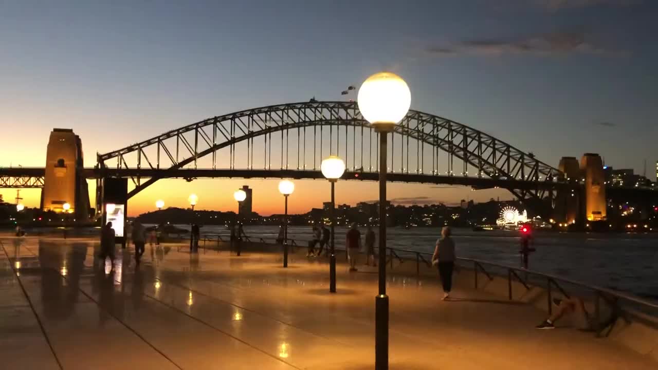 Night view of Sydney Opera House and Harbour bridge in Australia