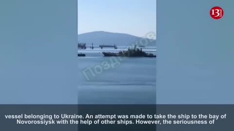 Image of a sinking Russian amphibious assault ship hit by Ukrainian uncrewed surface vessels K