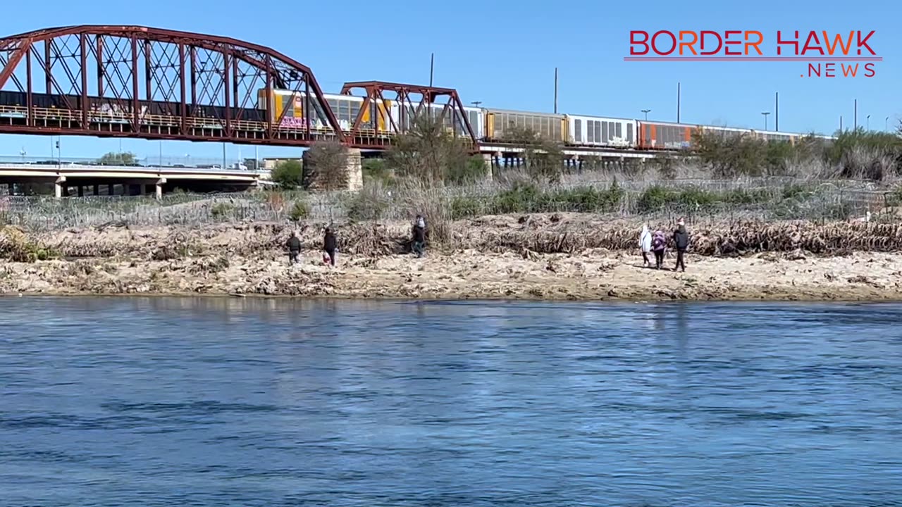 Texas Soldiers Repel Illegals at Rio Grande - as Feds Walk Dozens More Across Bridge Above