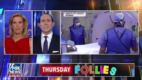 Biden almost takes out flag on way up to podium