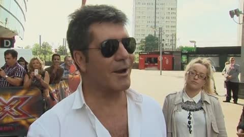 Simon Cowell has some stern words for Cheryl Cole