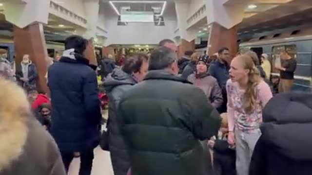 People taking shelter inside a subway station in Kharkiv