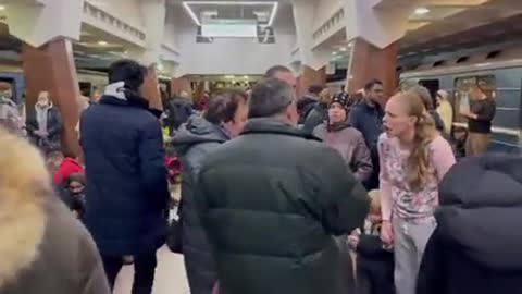 People taking shelter inside a subway station in Kharkiv