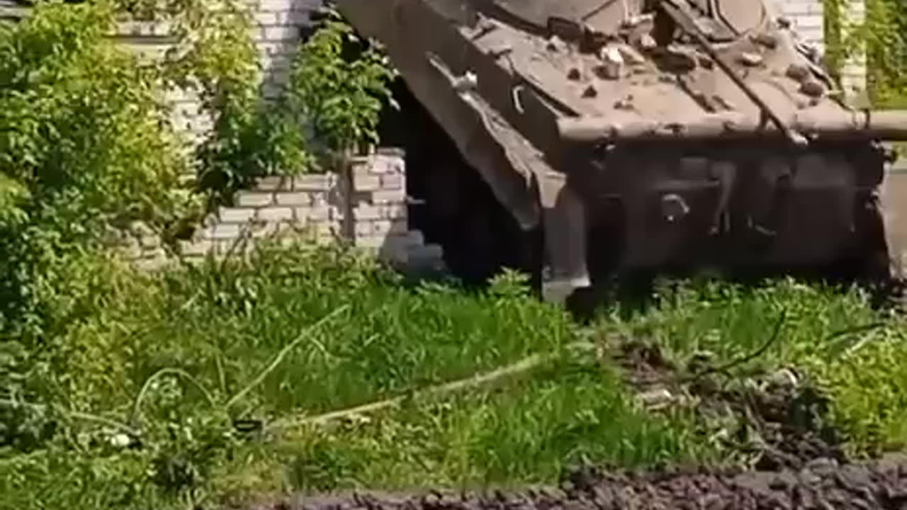 Ukrainian Tank Drives Through Brick Wall