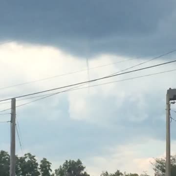 Small tornado on sunny day