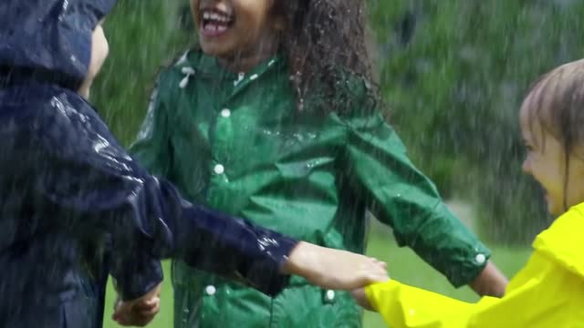 Kids playing in rain