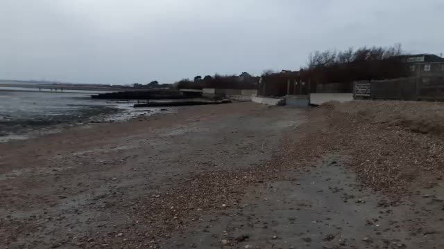 Having a coffee on a beach.