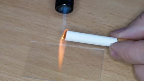 Make a good cigarette prop before some very uncomfortable close-ups of lips