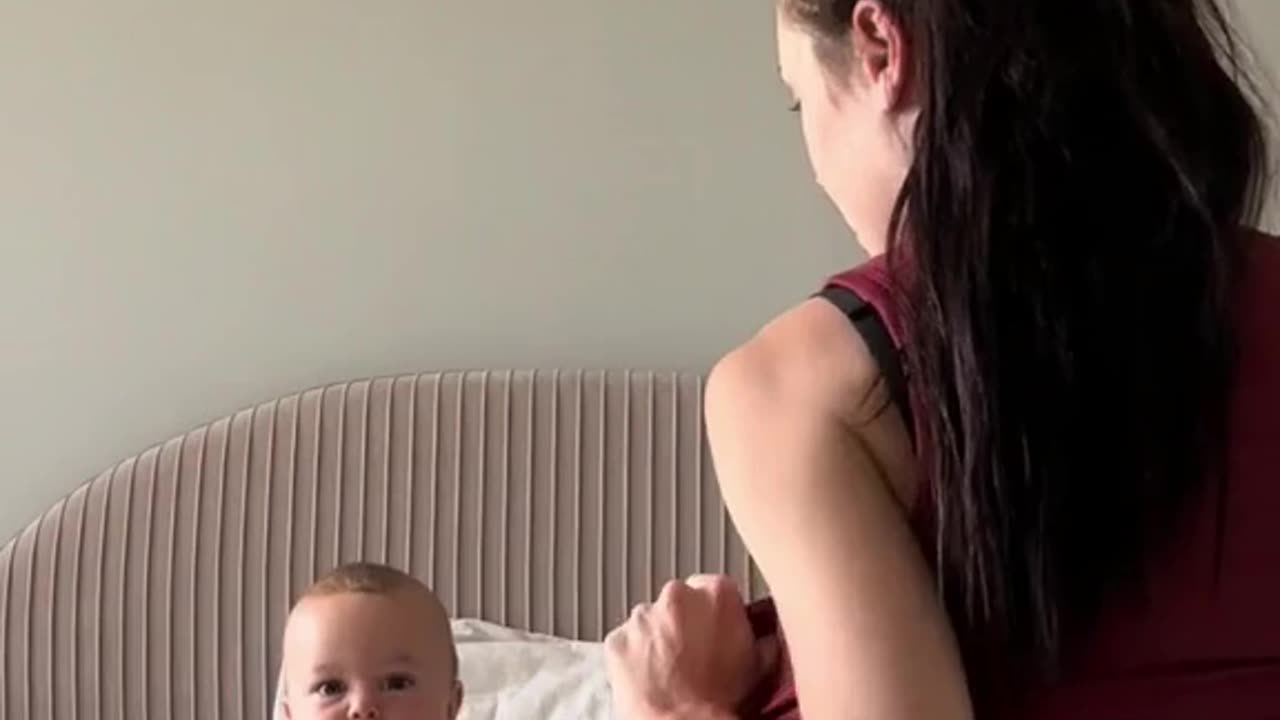 Mother Showing Breast to Her Breastfed Baby