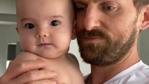 My cute child, Dad often holds him to dance