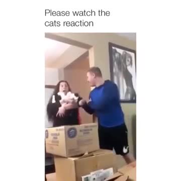 Guy Scares Lady Holding Cat