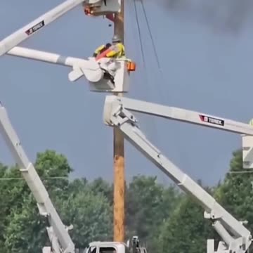 INTENSE moment electrical lineman gets stuck in a blaze