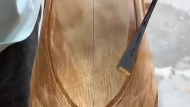 Man turns block of wood into miniature truck