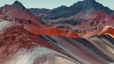 Rainbow Mountain is located in the Andes Mountains of Peru