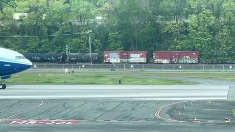 Boeing 777X Taxiing off the Runway