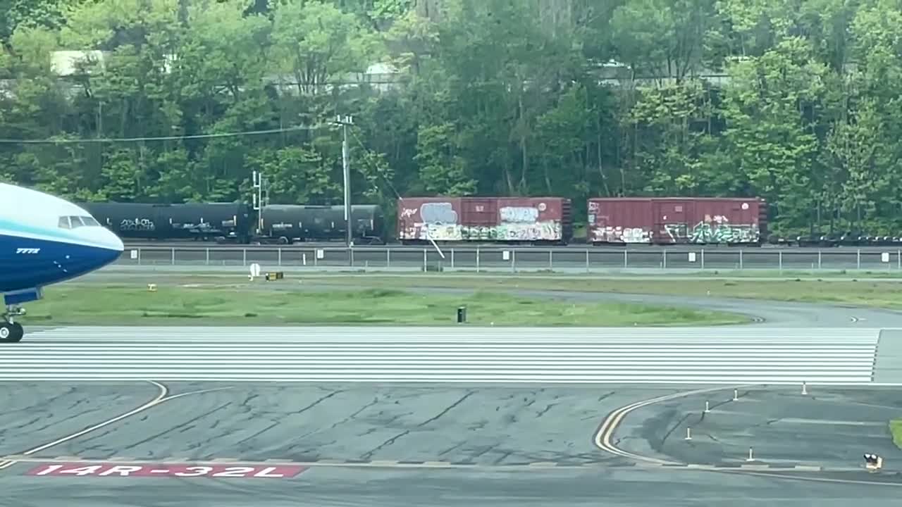 Boeing 777X Taxiing off the Runway