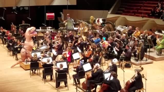 T-Rex Conducting Jurassic Park Theme Song