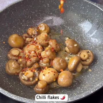 "Mouthwatering Magic: Unveiling the Delectable Delight of Cheesy Butter Garlic Mushrooms"