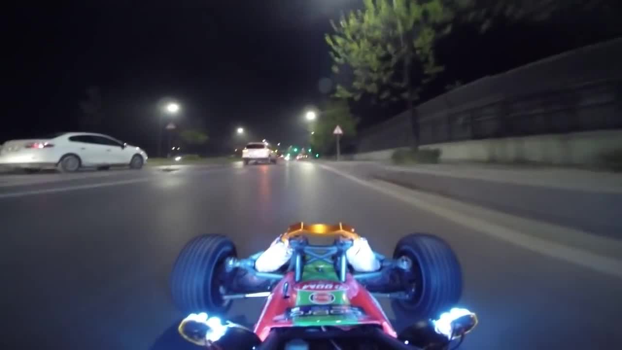 It's hard to believe that a remote control car is driving on the road