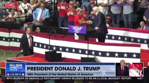 Central casting comes up on the stage during Trump speech
