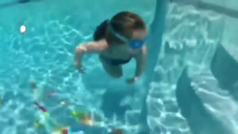 Babies Swimming Underwater