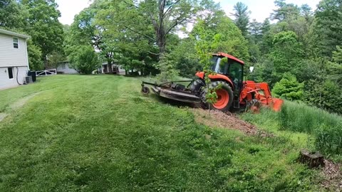 Kubota M7060 Kubota Bush Hogging tall grass