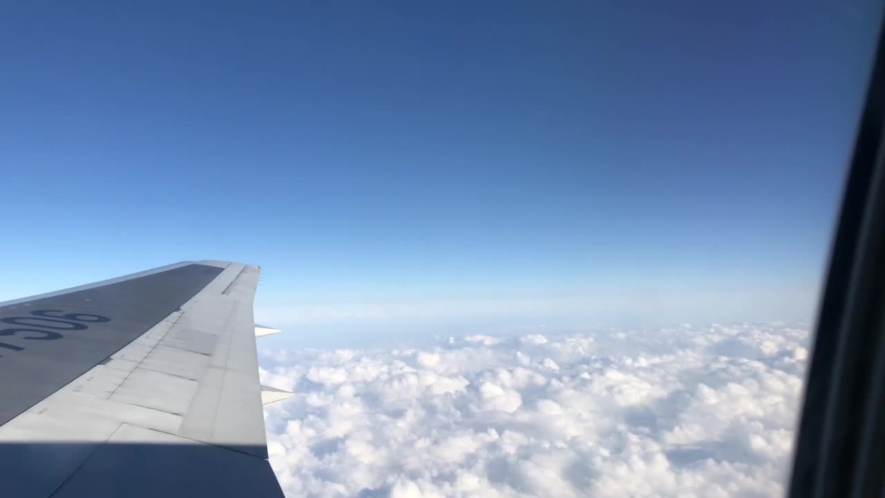 the sky visible from the airplane window